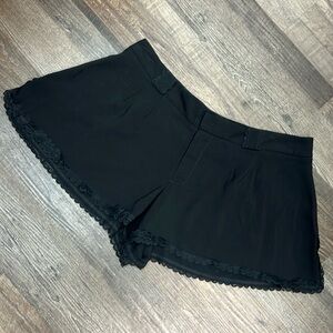 Guess black slack shorts with lace trim size L
